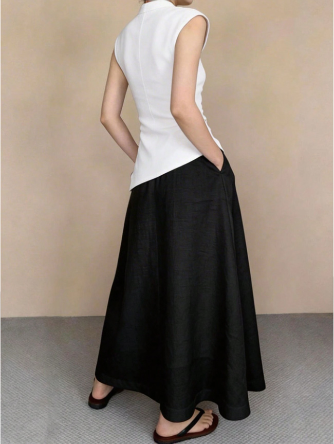 full body side view black vintage flowy long skirt with side pockets, casual streetwear high waist maxi skirt daily outfit